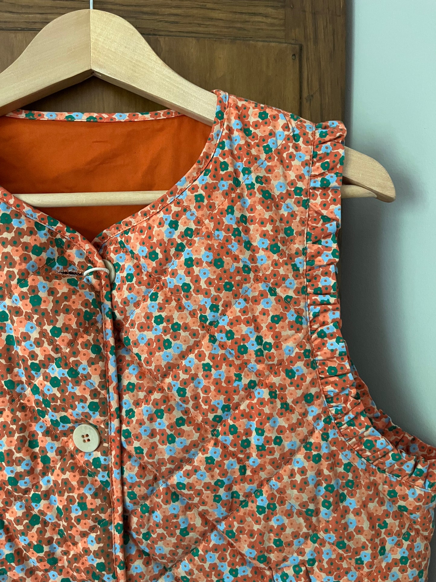 Veste sans manche fleurie The tiny big sister (Large)