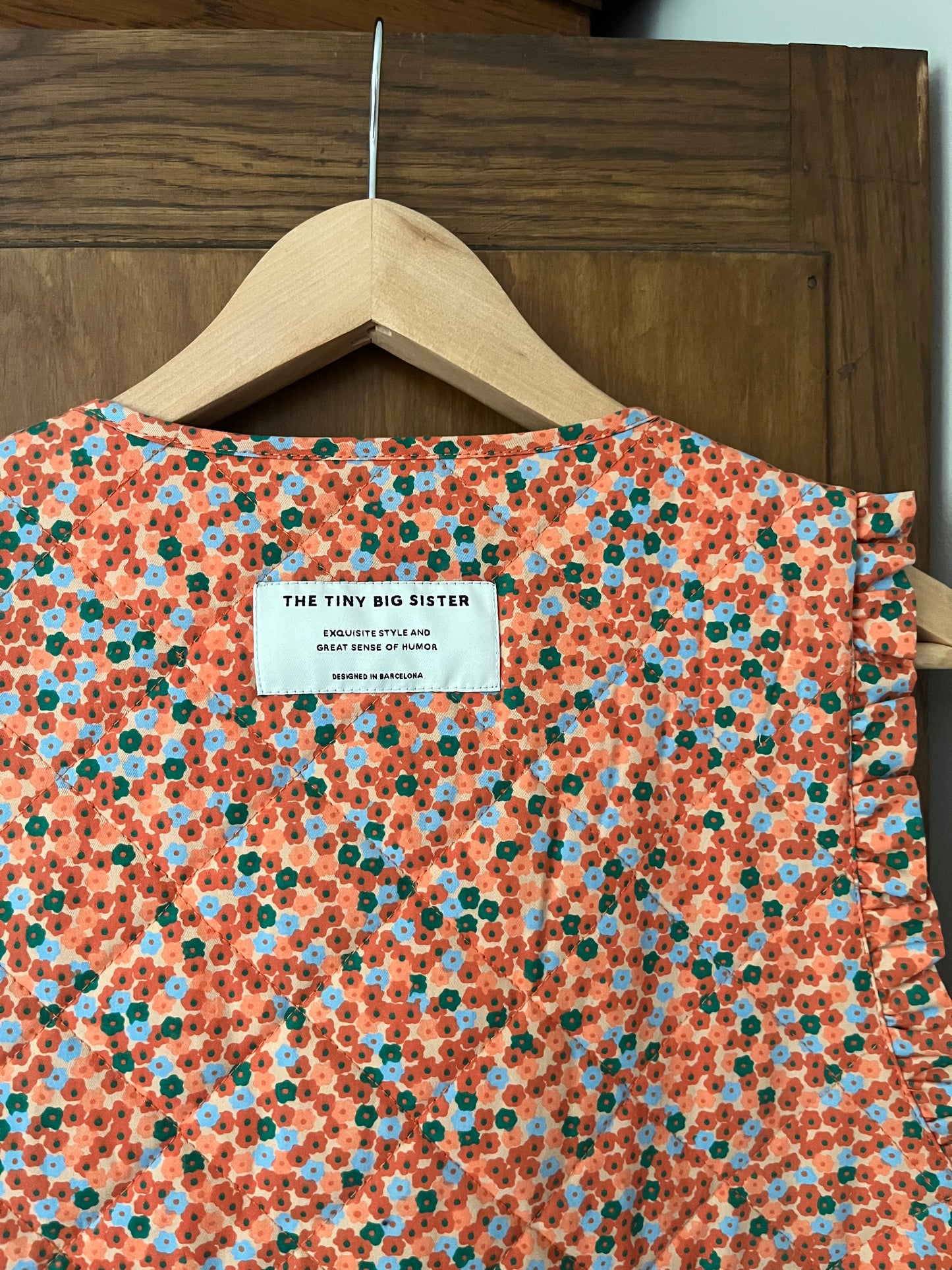 Veste sans manche fleurie The tiny big sister (Large)