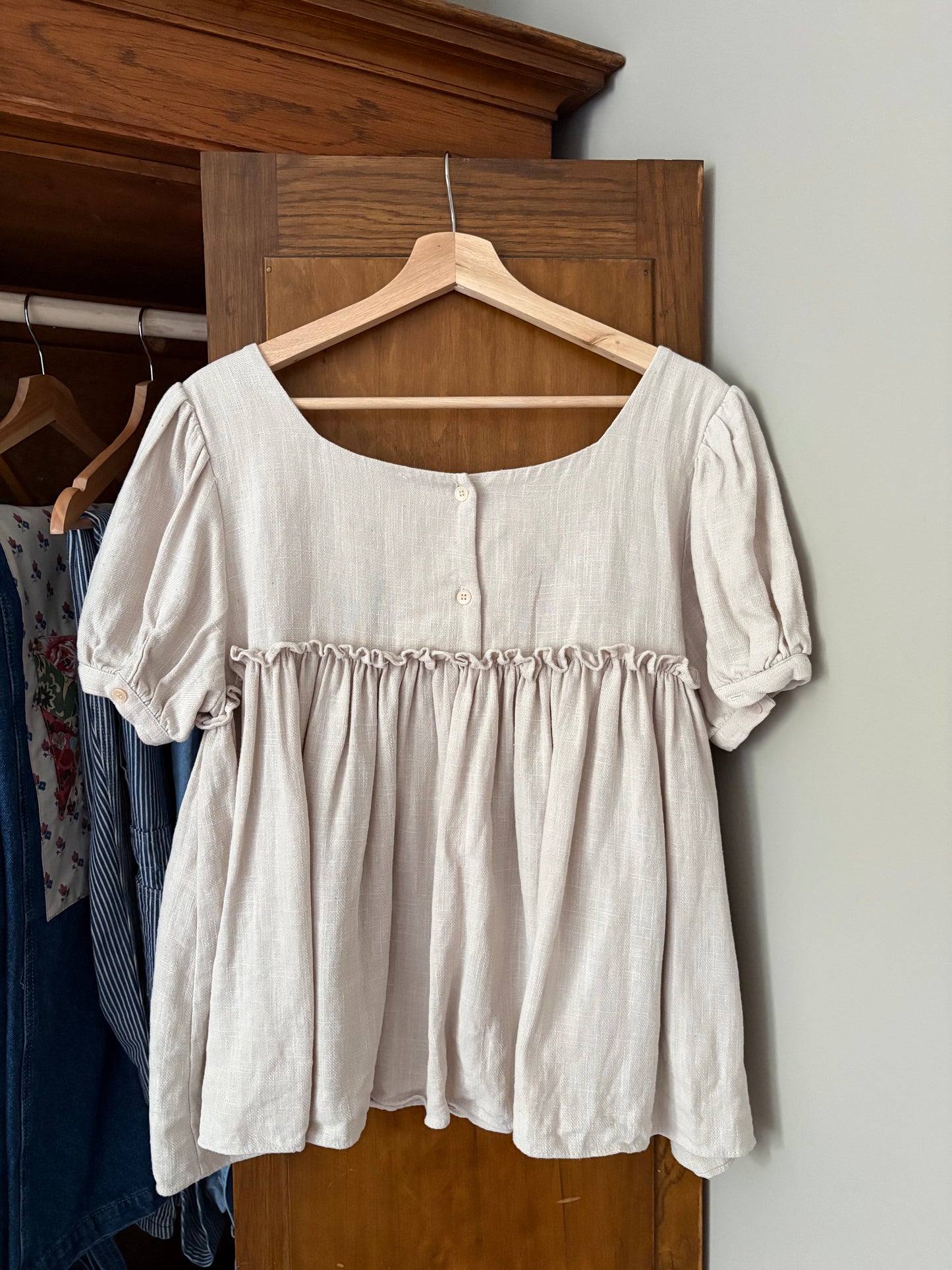 Haut beige effet lin (Médium)